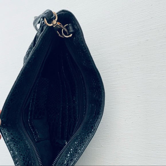 Michael Kors Black
Python Embossed
Leather Clutch - Picture 9 of 10